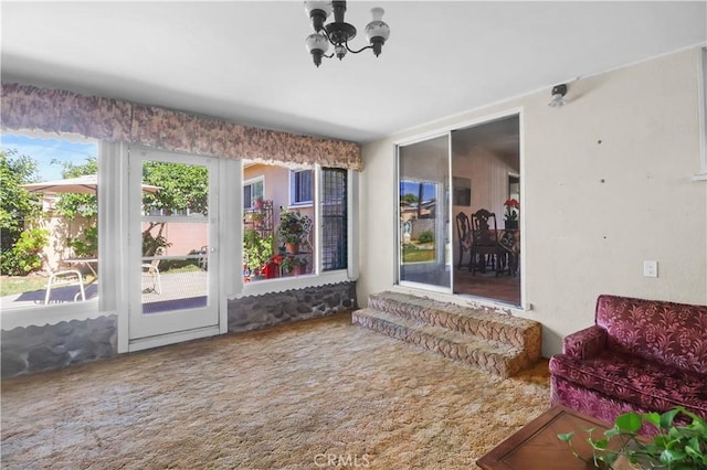 8707 Chester St, Paramount, CA 90723 - sunroom / solarium featuring a chandelier