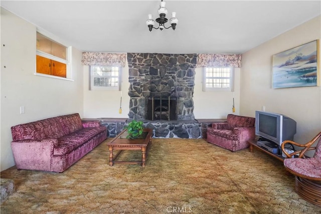 8707 Chester St, Paramount, CA 90723 - living room featuring a stone fireplace and a chandelier