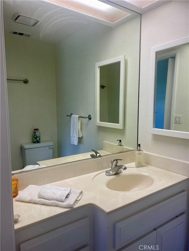 1871 Golden Rain Rd Unit M14-26H, Seal Beach, CA 90740 - half bathroom featuring vanity and toilet