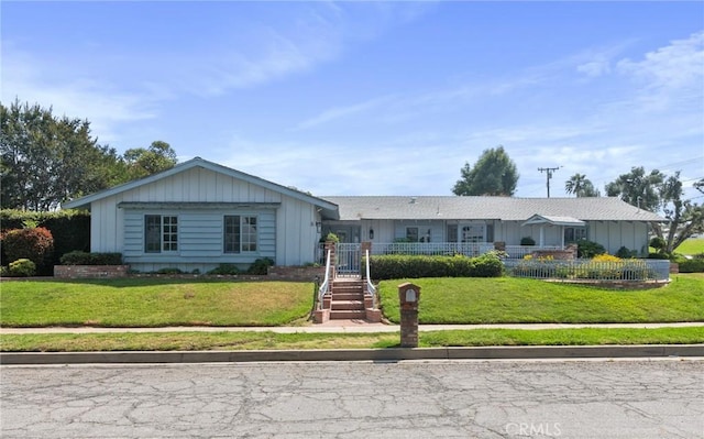 6210 Riverside Ave, Rialto, CA 92377 - ranch-style house with board and batten siding