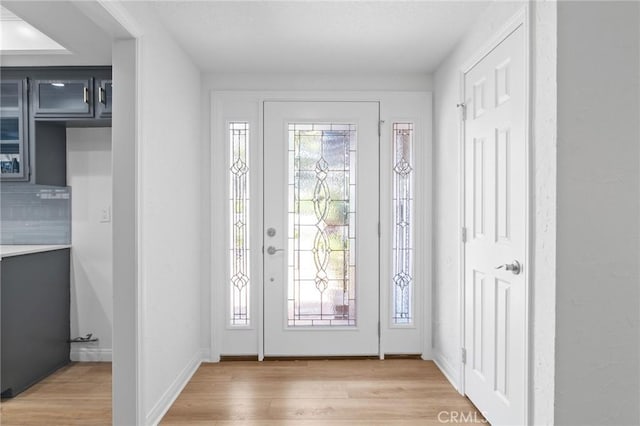 6210 Riverside Ave, Rialto, CA 92377 - entryway with light wood-style floors