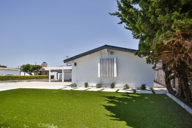 13282 Cherry St, Westminster, CA 92683 - view of front of house with stucco siding and a front lawn