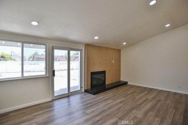 13282 Cherry St, Westminster, CA 92683 - unfurnished living room with recessed lighting, wood finished floors, and a large fireplace