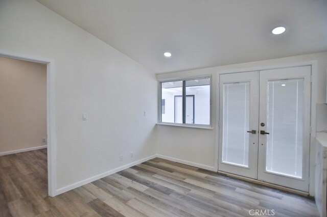 13282 Cherry St, Westminster, CA 92683 - entrance foyer featuring wood finished floors, french doors, recessed lighting, and lofted ceiling