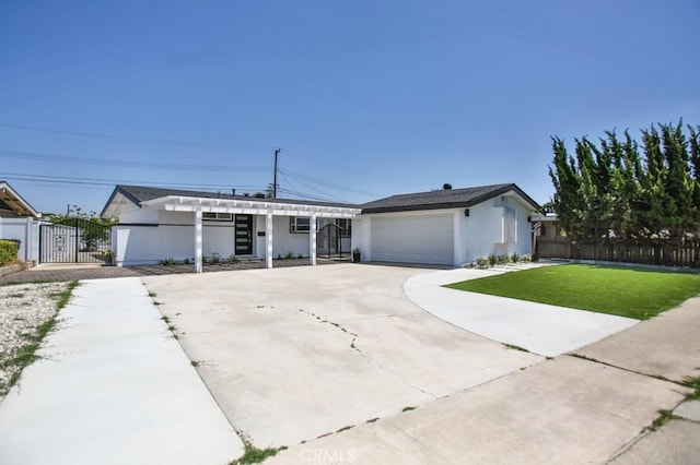 13282 Cherry St, Westminster, CA 92683 - view of front of property featuring driveway, stucco siding, and a gate