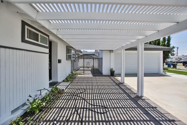 13282 Cherry St, Westminster, CA 92683 - view of patio / terrace featuring a garage and a pergola