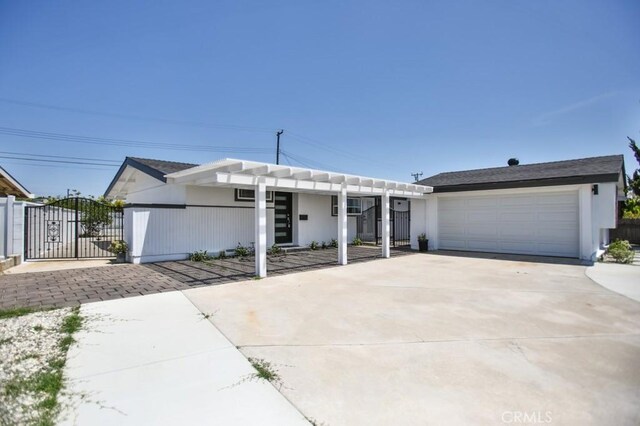 13282 Cherry St, Westminster, CA 92683 - view of front facade featuring a garage and concrete driveway