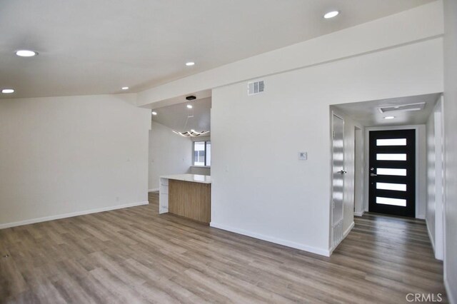 13282 Cherry St, Westminster, CA 92683 - unfurnished living room with wood finished floors and recessed lighting