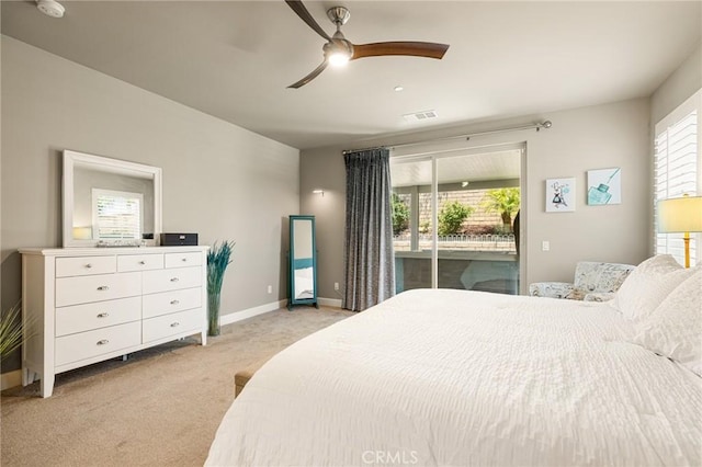 24420 Crooked Trail Dr, Menifee, CA 92584 - bedroom featuring access to outside, light carpet, and a ceiling fan