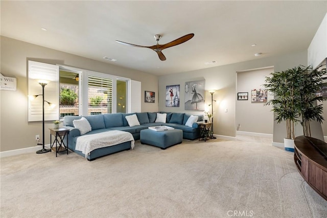 24420 Crooked Trail Dr, Menifee, CA 92584 - carpeted living area featuring a ceiling fan and baseboards