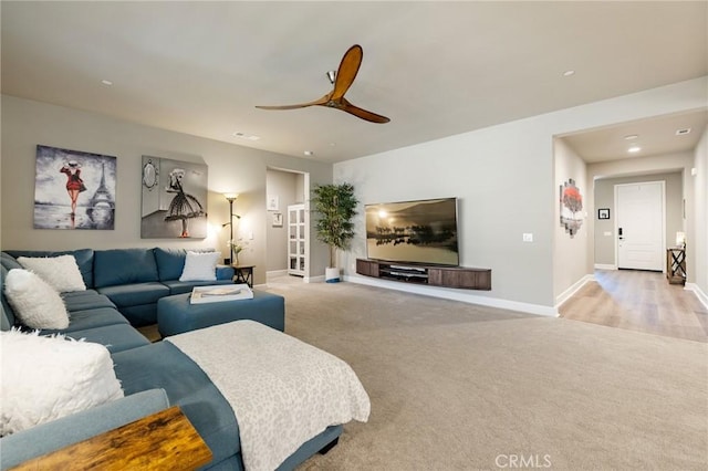 24420 Crooked Trail Dr, Menifee, CA 92584 - living area featuring light carpet, a ceiling fan, and recessed lighting