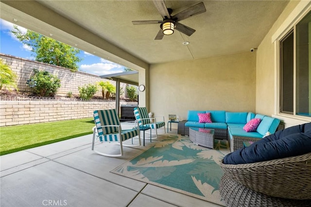 24420 Crooked Trail Dr, Menifee, CA 92584 - view of patio with an outdoor living space and a ceiling fan