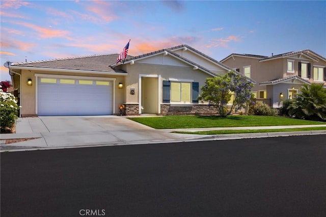 24420 Crooked Trail Dr, Menifee, CA 92584 - view of front of property with concrete driveway, an attached garage, a tiled roof, a front yard, and stucco siding