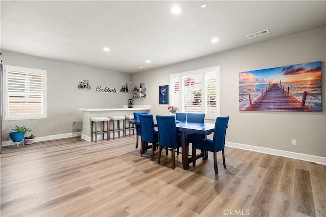 24420 Crooked Trail Dr, Menifee, CA 92584 - dining area with light wood-style flooring and recessed lighting