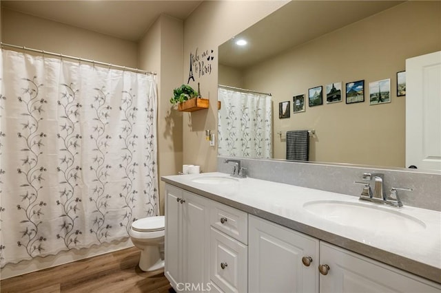 24420 Crooked Trail Dr, Menifee, CA 92584 - bathroom with wood finished floors, double vanity, and a shower with curtain
