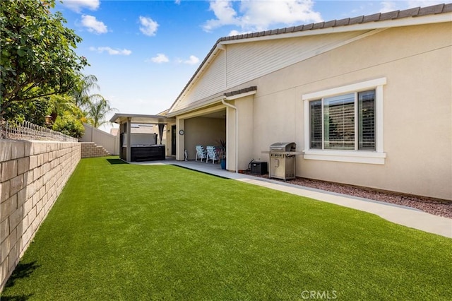 24420 Crooked Trail Dr, Menifee, CA 92584 - fenced backyard featuring a patio area and an attached garage