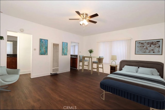 936 Olive Ave, Long Beach, CA 90813 - bedroom featuring wood finished floors, a heating unit, and a ceiling fan