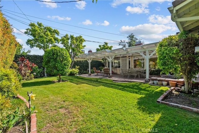 9214 Mclennan Ave, Northridge, CA 91343 - view of grassy yard with a pergola and a patio area