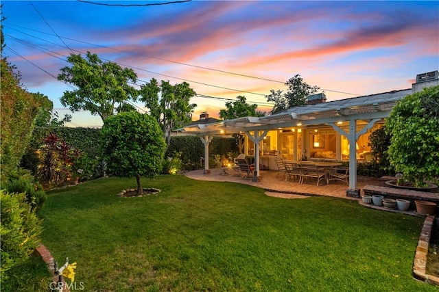 9214 Mclennan Ave, Northridge, CA 91343 - yard at dusk featuring a pergola, a yard, and a patio