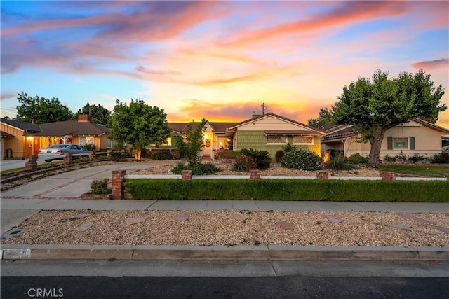 9214 Mclennan Ave, Northridge, CA 91343 - view of front facade featuring concrete driveway