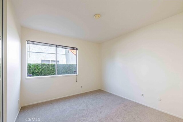 28752 Pisces St, Agoura Hills, CA 91301 - empty room with light colored carpet and a smoke detector