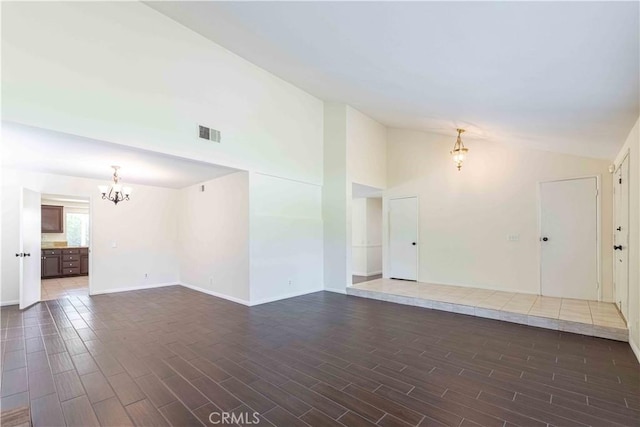28752 Pisces St, Agoura Hills, CA 91301 - unfurnished living room featuring a chandelier, dark wood finished floors, and high vaulted ceiling