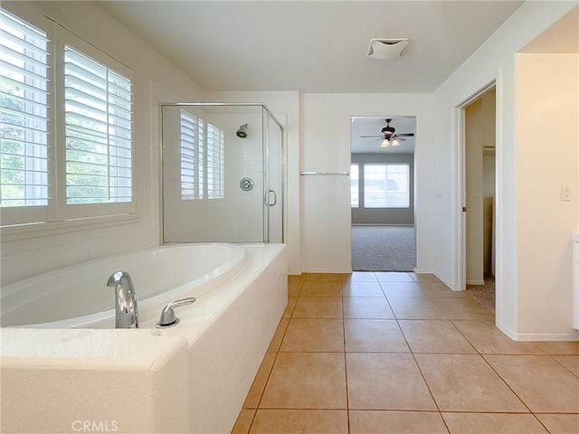 41926 Bonita Dr, Palmdale, CA 93551 - bathroom with a shower stall, a garden tub, ceiling fan, and tile patterned flooring