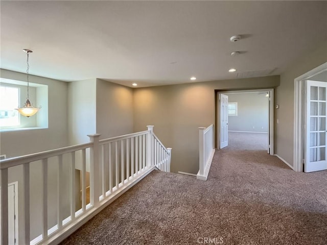 41926 Bonita Dr, Palmdale, CA 93551 - corridor with an upstairs landing, carpet floors, healthy amount of natural light, and recessed lighting
