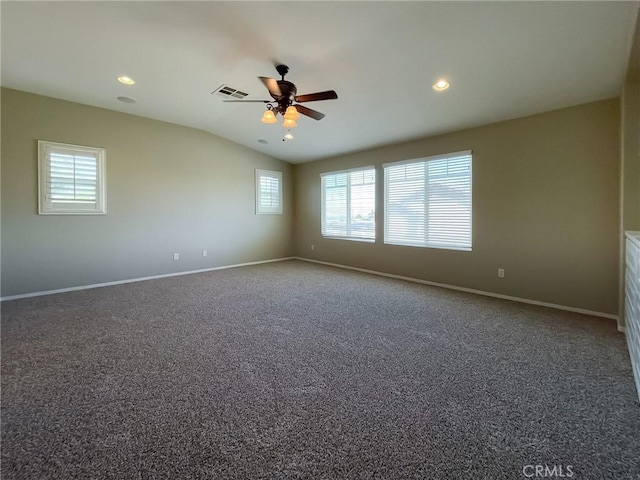 41926 Bonita Dr, Palmdale, CA 93551 - spare room featuring plenty of natural light, a ceiling fan, vaulted ceiling, carpet floors, and recessed lighting