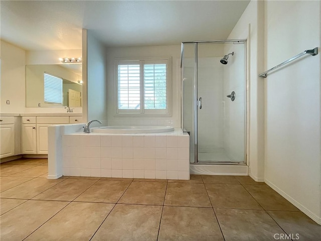 41926 Bonita Dr, Palmdale, CA 93551 - full bathroom with vanity, tile patterned flooring, a garden tub, and a stall shower