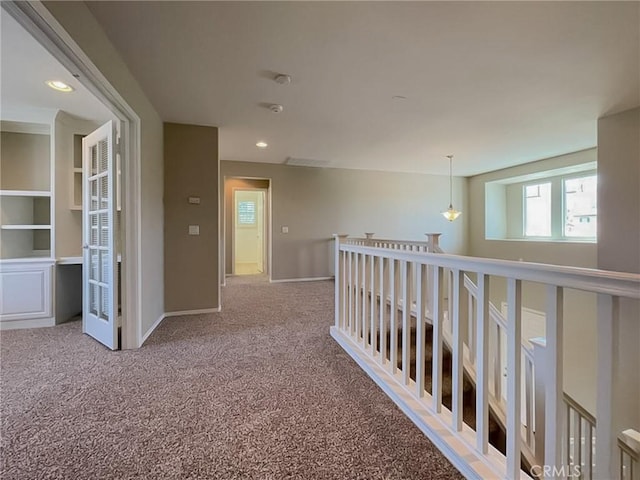 41926 Bonita Dr, Palmdale, CA 93551 - hallway with carpet, an upstairs landing, and recessed lighting