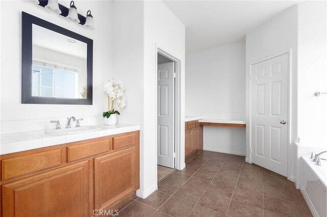 30315 Laruns St, Murrieta, CA 92563 - full bath featuring vanity, a bath, and tile patterned floors