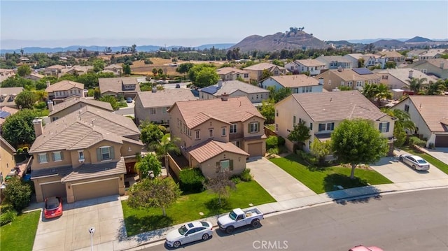 30315 Laruns St, Murrieta, CA 92563 - aerial perspective of suburban area featuring a mountainous background