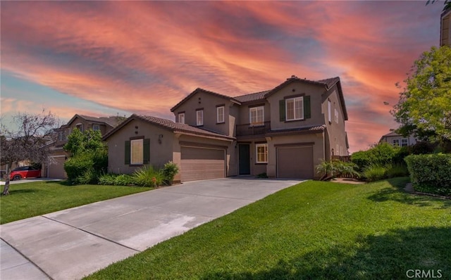 30315 Laruns St, Murrieta, CA 92563 - view of front of house with a tile roof, stucco siding, concrete driveway, a front yard, and an attached garage