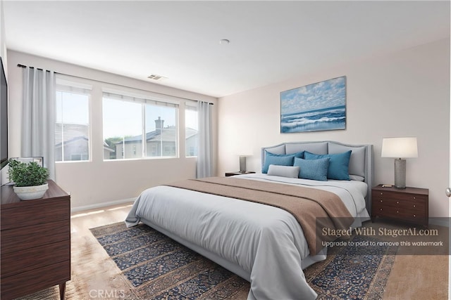 30315 Laruns St, Murrieta, CA 92563 - bedroom with wood finished floors and baseboards