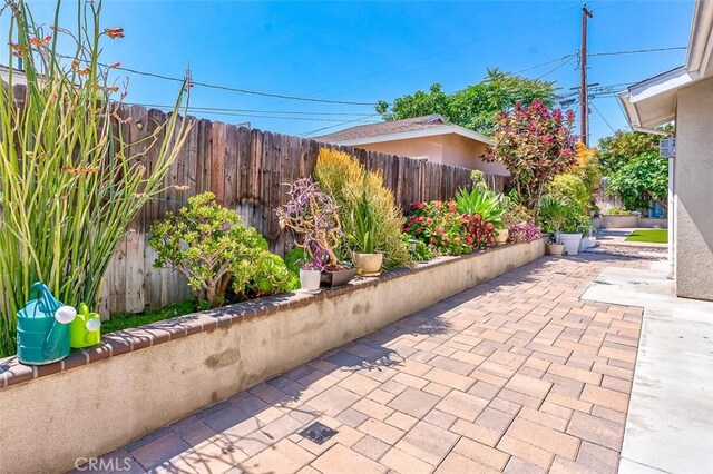 335 E Francis Ave, La Habra, CA 90631 - fenced backyard featuring a patio