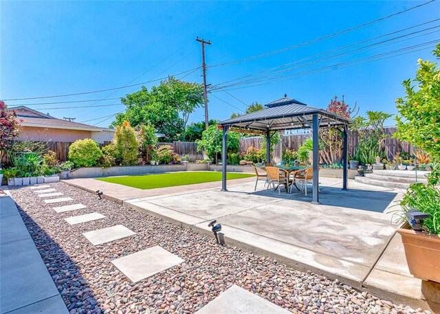 335 E Francis Ave, La Habra, CA 90631 - fenced backyard featuring a gazebo and a patio