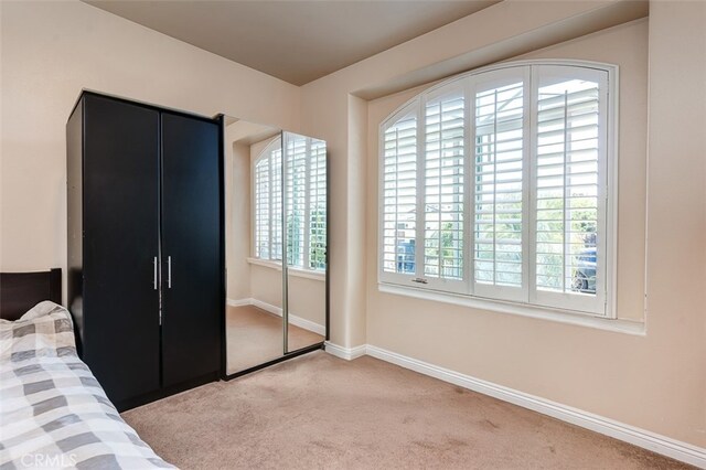 335 E Francis Ave, La Habra, CA 90631 - unfurnished bedroom featuring carpet floors and baseboards