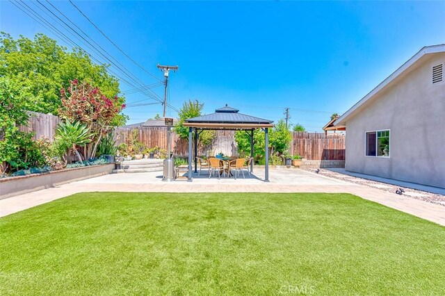 335 E Francis Ave, La Habra, CA 90631 - fenced backyard with a patio and a gazebo