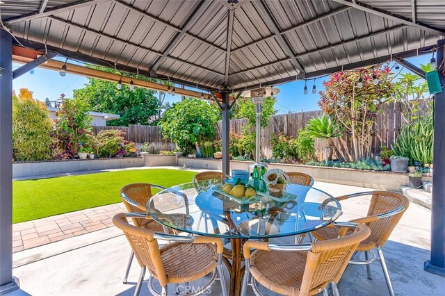 335 E Francis Ave, La Habra, CA 90631 - fenced backyard with a gazebo, a patio area, and outdoor dining area