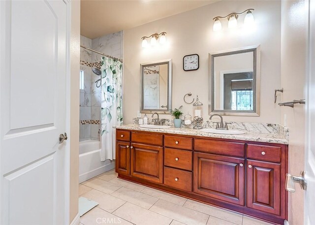 335 E Francis Ave, La Habra, CA 90631 - full bathroom with double vanity, shower / bath combo with shower curtain, and tile patterned floors