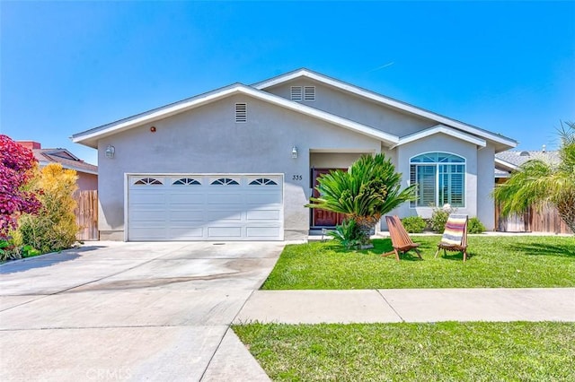 335 E Francis Ave, La Habra, CA 90631 - single story home with stucco siding, driveway, and an attached garage