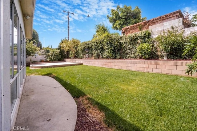 1129 Belbury Dr, Walnut, CA 91789 - view of grassy yard featuring a patio area