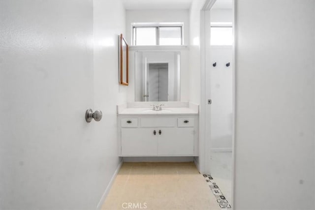 1129 Belbury Dr, Walnut, CA 91789 - bathroom with vanity and tile patterned flooring