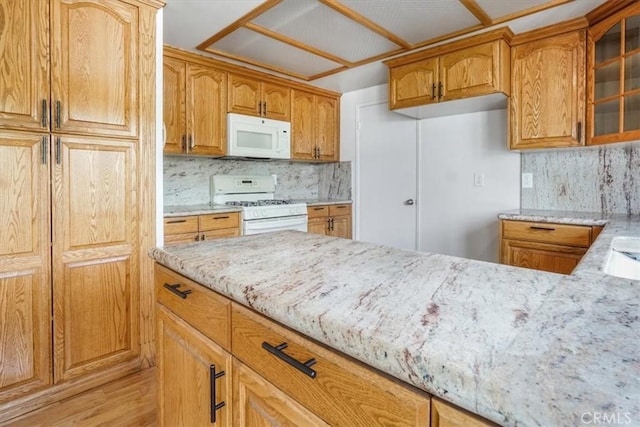 1129 Belbury Dr, Walnut, CA 91789 - kitchen with white appliances, light stone countertops, glass insert cabinets, brown cabinets, and tasteful backsplash