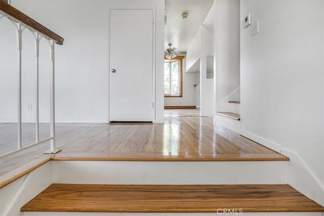 1129 Belbury Dr, Walnut, CA 91789 - stairs featuring ceiling fan and wood finished floors