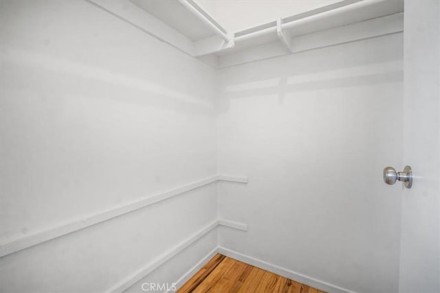 1129 Belbury Dr, Walnut, CA 91789 - spacious closet with wood finished floors