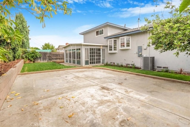 1129 Belbury Dr, Walnut, CA 91789 - rear view of property with a sunroom, stucco siding, and a patio