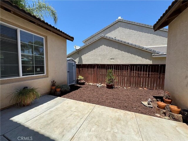 33314 Lazurite Way, Menifee, CA 92584 - view of patio / terrace featuring a storage shed