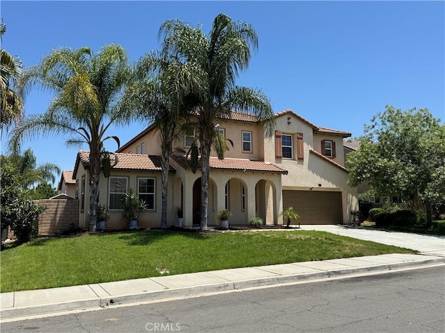 33314 Lazurite Way, Menifee, CA 92584 - mediterranean / spanish-style house featuring stucco siding, a garage, driveway, and a tile roof